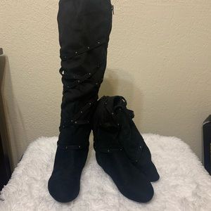 Black flat thigh high boots in suede